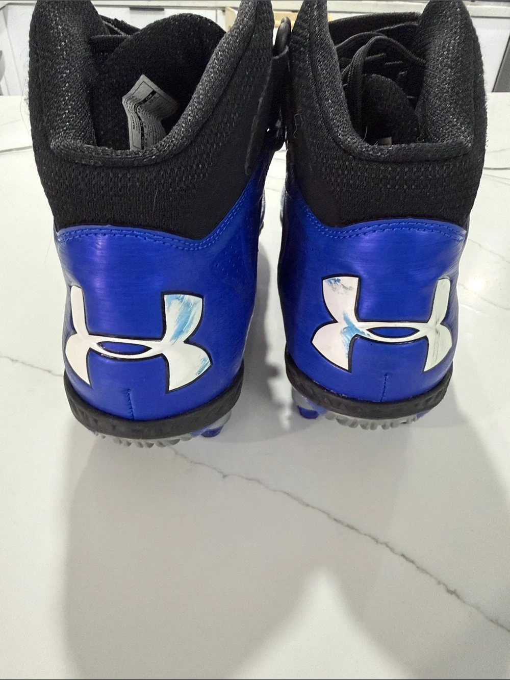 Under Armour Kids Black and Blue Football Cleats